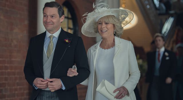 <p>Justin Downing</p> Dominic West and Olivia Williams in character as Charles and Camilla in season 6 of The Crown on Netflix.