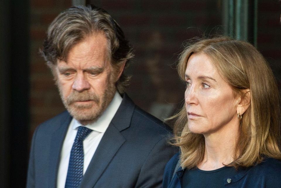 Felicity Huffman and William H. Macy exit the John Joseph Moakley United States Courthouse in Boston, where she was sentenced for her role in the college admissions scandal on Sept. 13, 2019.