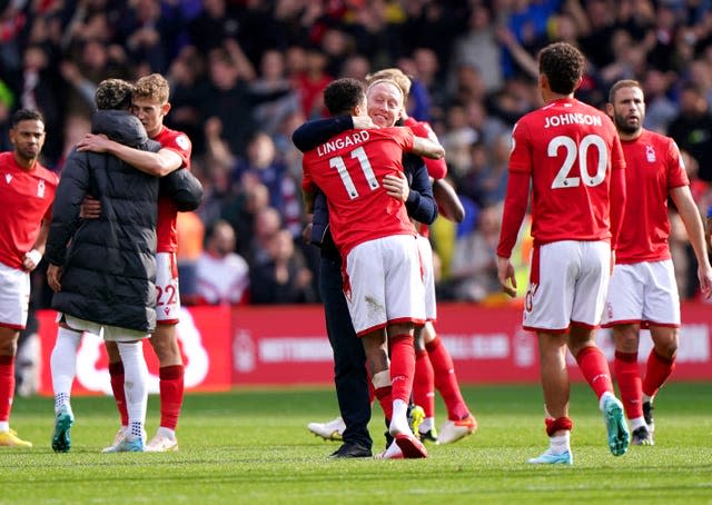 Forest manager Steve Cooper embraces Jesse Lingard at the end of the match at the City Ground (Joe Giddens/PA).