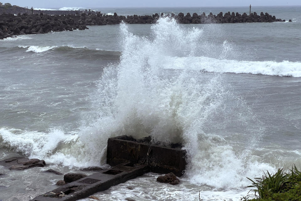 Waves crash on the shore ahead of typhoon Khanun in the port city of Keelung near Taipei in northern Taiwan on Thursday, Aug. 3, 2023. (AP Photo/Johnson Lai)