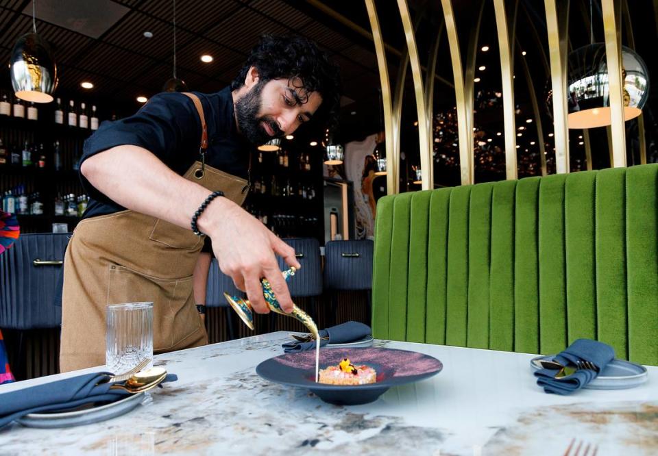 Executive chef Bhavin Chhatwani prepares a “North Meets South” dessert at Tamasha Modern Indian on Wednesday, May 8, 2024, in Raleigh, N.C.