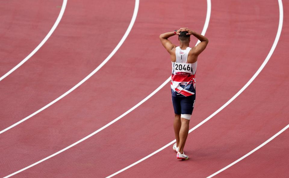 A disconsolate Adam Gemili suffered a hamstring injury in the men’s 200m heats (Martin Rickett/PA) (PA Wire)