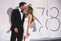 Jennifer Lopez, right, and Ben Affleck pose for photographers upon arrival at the premiere of the film 'The Last Duel' during the 78th edition of the Venice Film Festival in Venice, Italy, Friday, Sept. 10, 2021. (Photo by Joel C Ryan/Invision/AP)