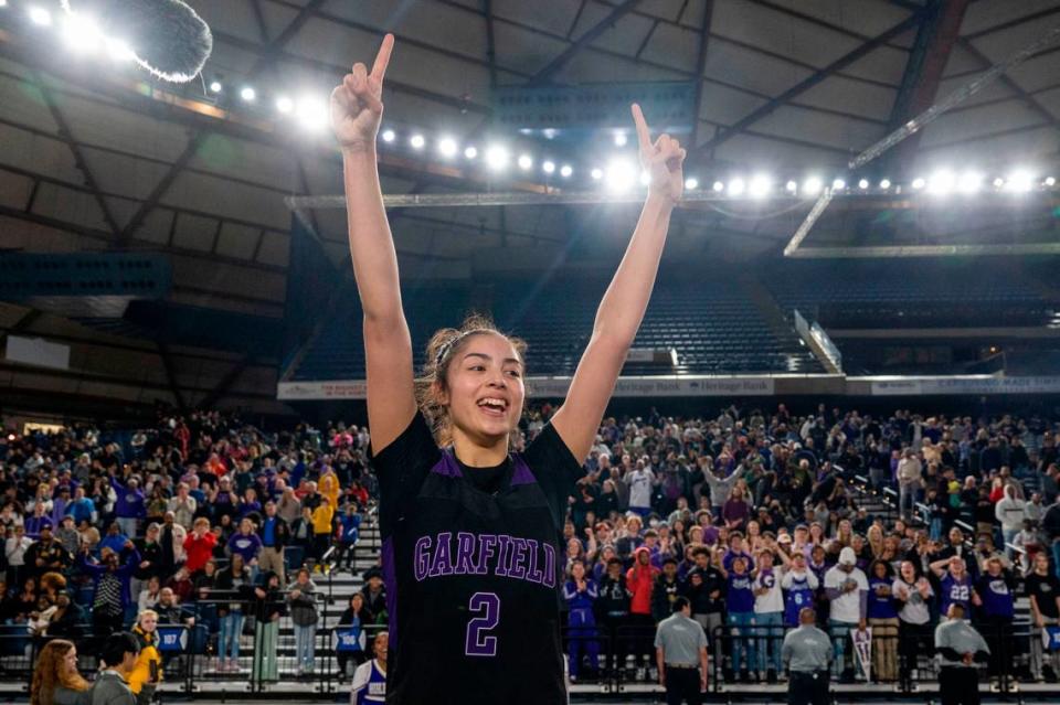 Garfield guard Katie Fiso (2) celebrates after the Bulldogs beat Lake Washington, 58-49, to win the Class 3A championship game on Saturday, March 4, 2023, in Tacoma, Wash.