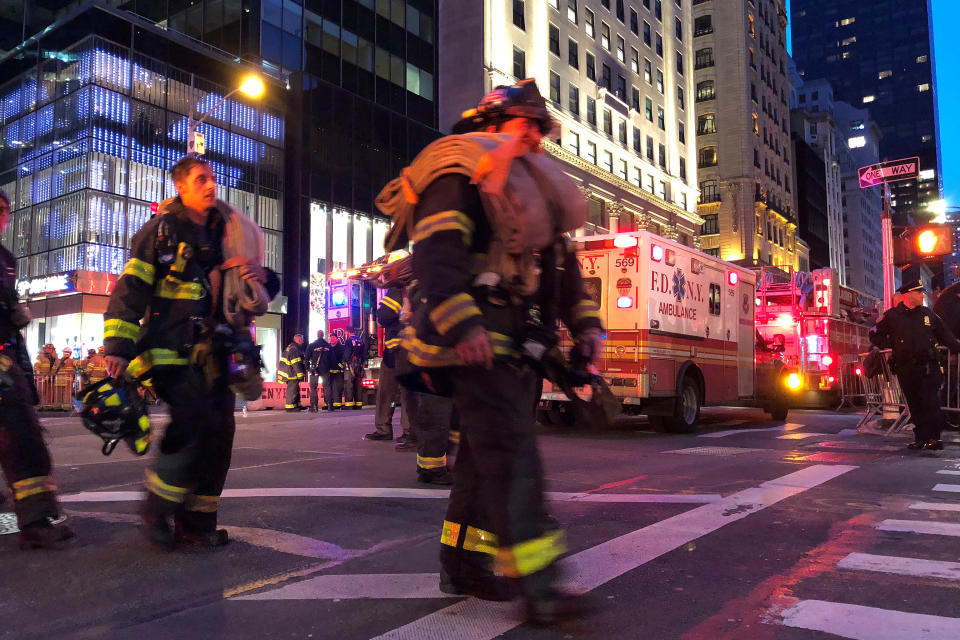 <p>First responders work on a fire at Trump Tower in the Manhattan borough of New York City, New York, April 7, 2018. (Photo: Catherine Koppel/Reuters) </p>