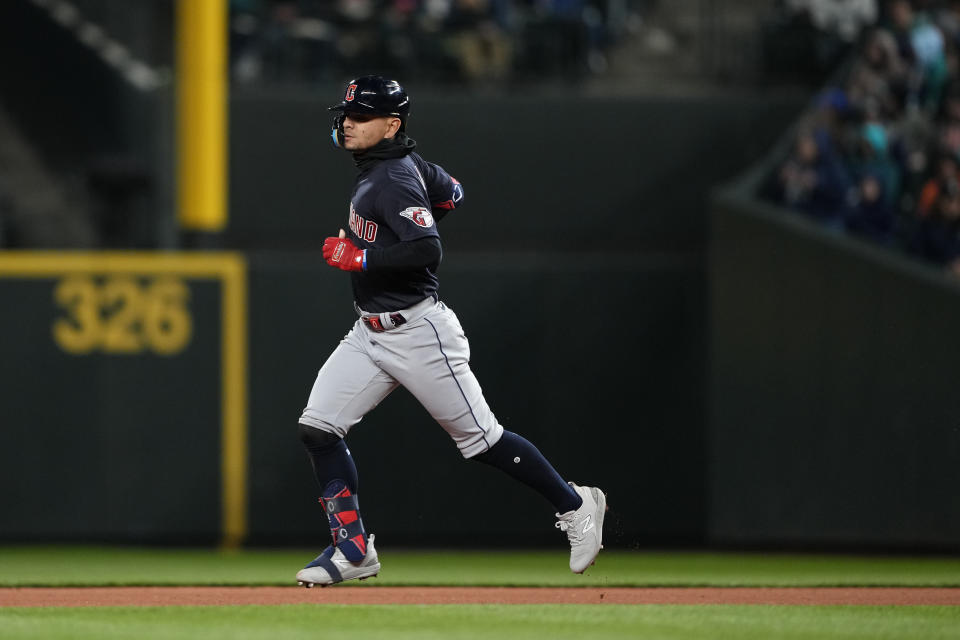 Cleveland Guardians' Andres Gimenez runs the bases after hitting a solo home run against the Seattle Mariners during the seventh inning of a baseball game Saturday, April 1, 2023, in Seattle. (AP Photo/Lindsey Wasson)