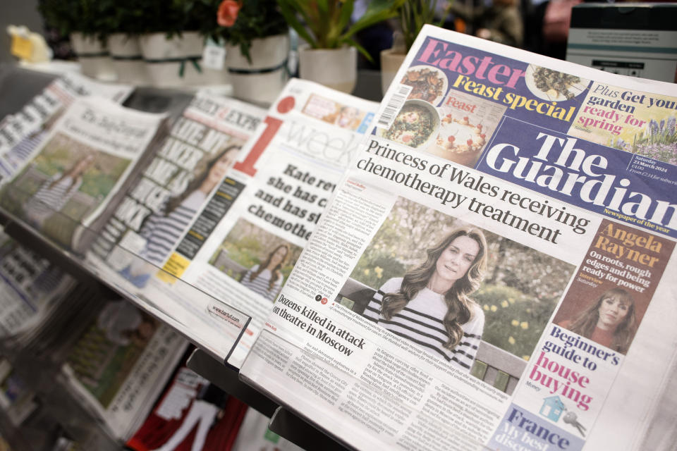 Newspaper front-pages are seen at a newsagent in London, Saturday, March 23, 2024. Britain's Kate, Princess of Wales's revelation she is undergoing treatment for cancer has sparked an outpouring of support and well wishes from around the world. (AP Photo/David Cliff)