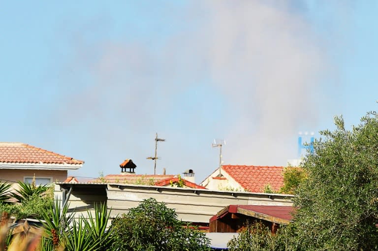 Smoke rises from a controlled explosion carried out by police in Alcanar