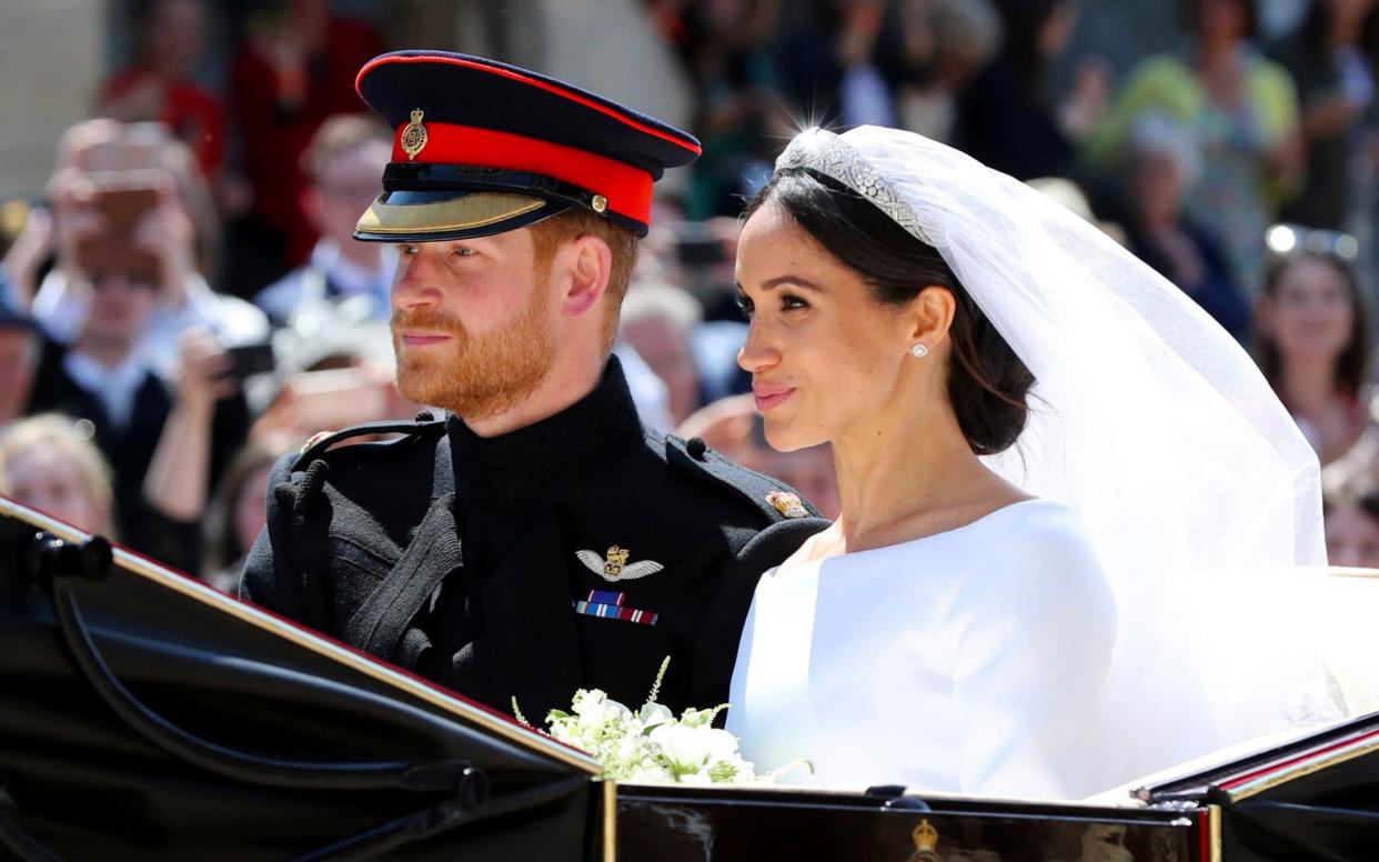 The happy couple leave after their wedding ceremony at Windsor Castle - POOL PA