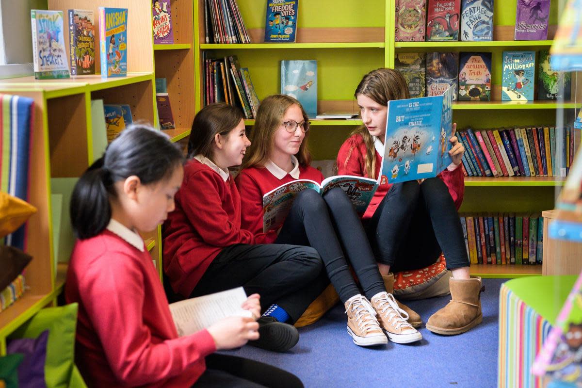 Children at St Francis Primary School using the new library <i>(Image: Oxford University Press)</i>
