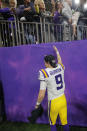 LSU quarterback Joe Burrow leaves the field after a NCAA College Football Playoff national championship game against Clemson, Monday, Jan. 13, 2020, in New Orleans. LSU won 42-25. (AP Photo/Gerald Herbert)