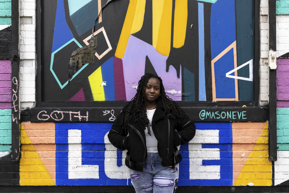 Jessica Naissant poses in front of the location where she hopes to open a cannabis dispensary, Thursday, Nov. 17, 2022, in the Brooklyn borough of New York. Under pressure to launch one of the nation’s most hotly anticipated legal marijuana markets, the state Cannabis Control Board is set Monday to consider awarding some dispensary licenses to entrepreneurs and nonprofit groups — a major step that comes as cannabis regulators stress that they're trying to stop unlicensed sellers. (AP Photo/Julia Nikhinson)