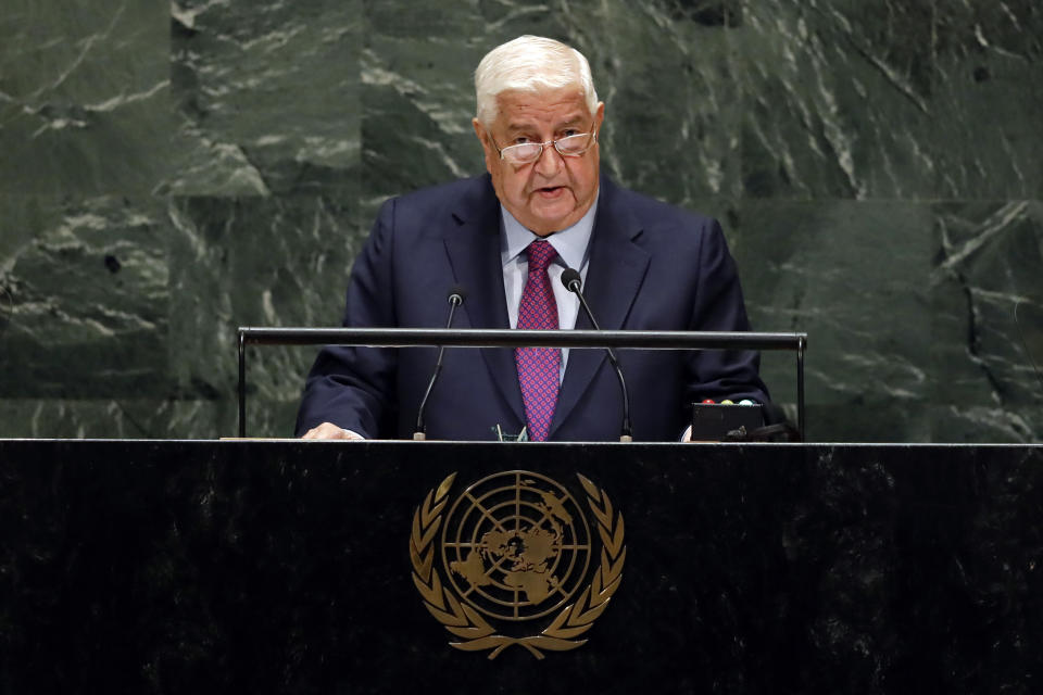 Syria's Deputy Prime Minister Walid Al-Moualem addresses the 74th session of the United Nations General Assembly, Saturday, Sept. 28, 2019. (AP Photo/Richard Drew)