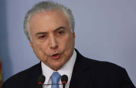 Brazil's President Michel Temer delivers a speech after deputies of the lower chamber of Brazil's Congress voted to reject a corruption charge against him at the Planalto Palace in Brasilia, Brazil August 2, 2017. REUTERS/Adriano Machado