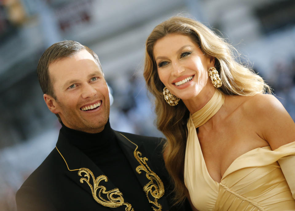 Tom Brady and Gisele Bundchen arrive at the Metropolitan Museum of Art Costume Institute Gala (Met Gala) to celebrate the opening of “Heavenly Bodies: Fashion and the Catholic Imagination” in the Manhattan borough of New York, U.S., May 7, 2018. REUTERS/Eduardo Munoz