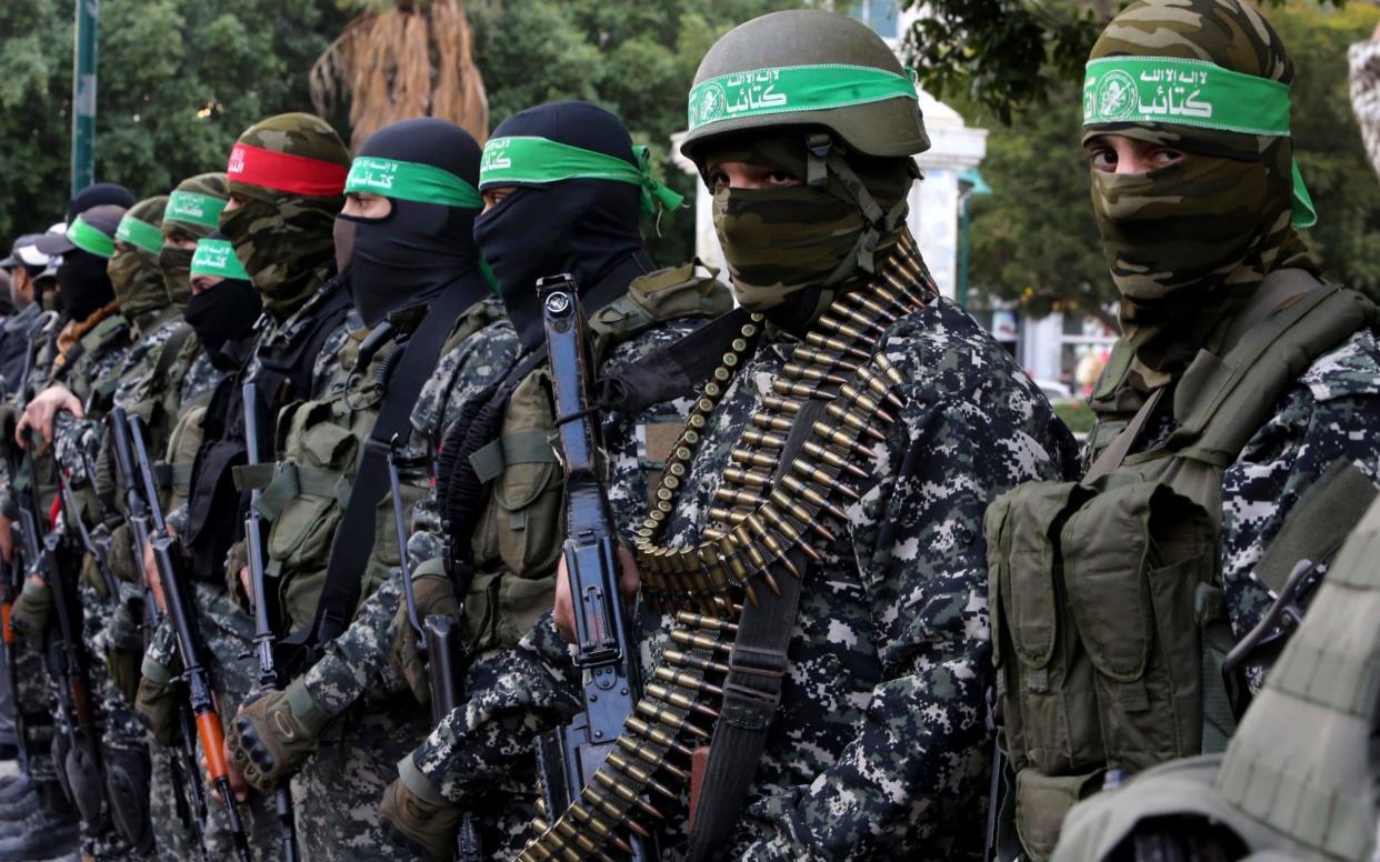 Both Hamas (pictured) and the Western-backed Palestinian Authority were accused of torture - AP