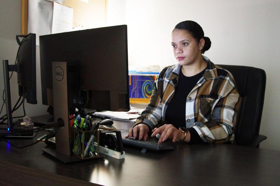 Brockton Community Justice Support Center Treatment Manager Sofia Alves works in her office in between activities at the center on Tuesday, Dec. 13, 2022.