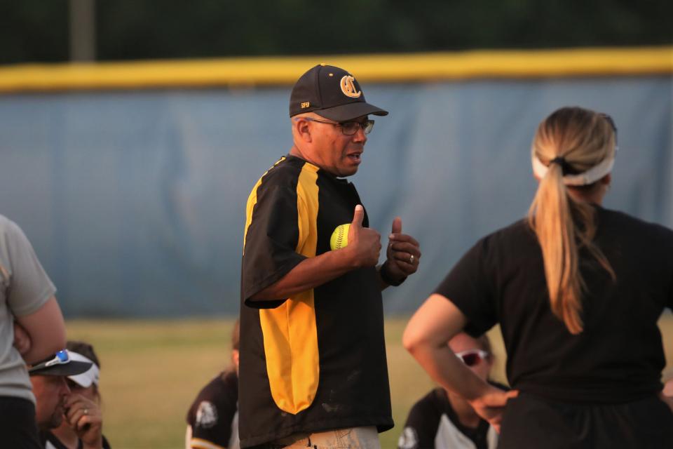 Cowan softball head coach Curtis Bynum talks to his team after losing 5-3 to Caston in the IHSAA Class 1A semistate championship at Frankfort High School on Saturday, June 3, 2023.