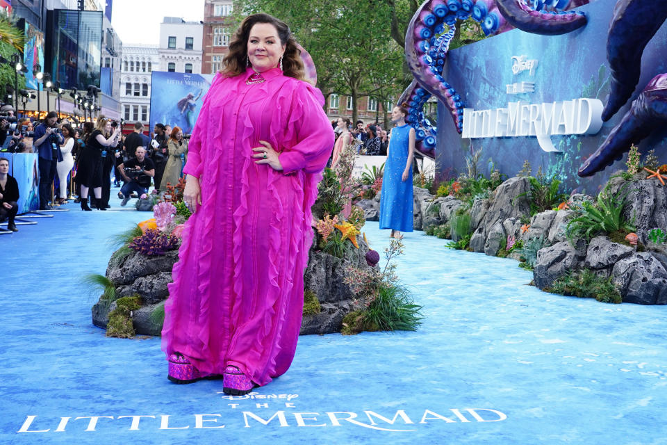 melissa mccarthy poses on a red carpet for the The Little Mermaid