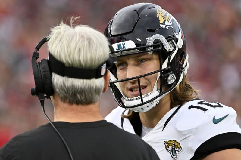 Jacksonville Jaguars quarterback Trevor Lawrence talks with head coach Doug Pederson during a loss to the Tampa Bay Buccaneers on Sunday at Raymond James Stadium in Tampa, Fla. Photo by Steve Nesius/UPI