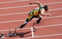 Oscar Pistorius of South Africa shortly after the start of his race in the men's 400m heats during the London 2012 Olympic Games Athletics, Track and Field events at the Olympic Stadium, London, Britain, 04 August 2012. EPA/DIEGO AZUBEL