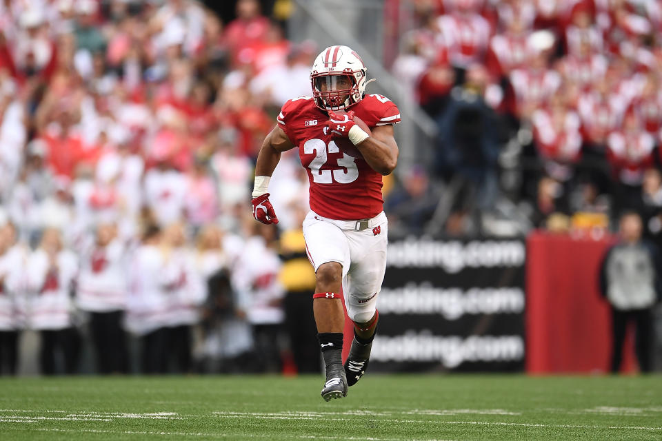 Wisconsin RB Jonathan Taylor pulled away from the Michigan defense on Saturday. (Getty Images)