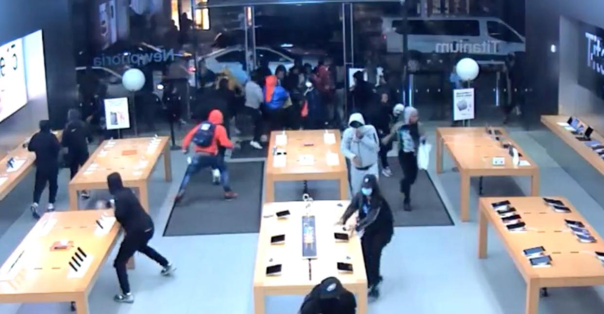 Screenshot of police footage showing the looting of the Apple store in Philadelphia.