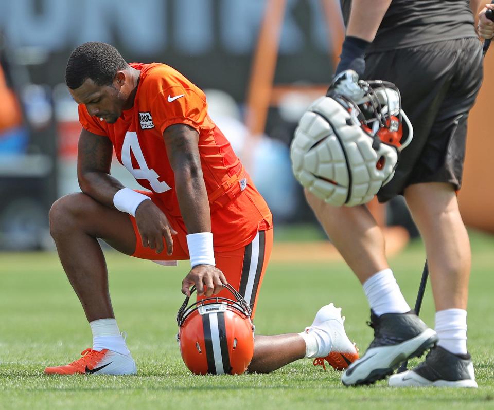 Cleveland Browns quarterback Deshaun Watson rests in between reps during the NFL football team's football training camp in Berea on Wednesday.