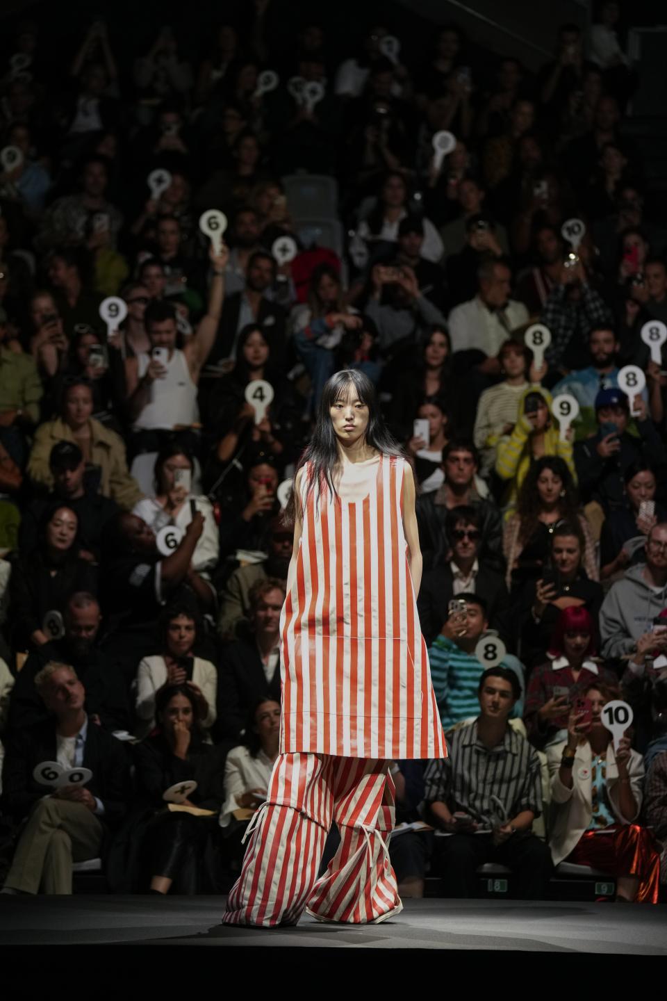 A model wears a creation as part of the Sunnei women's Spring Summer 2024 collection presented in Milan, Italy, Friday, Sept. 22, 2023. (AP Photo/Antonio Calanni)