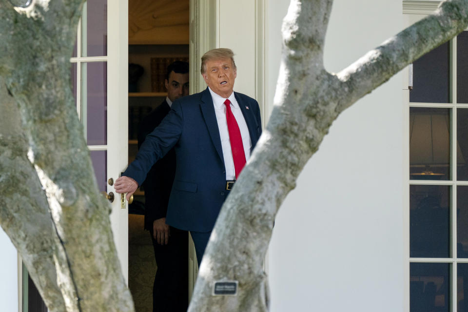 President Donald Trump walks from the Oval Office before boarding Marine One at the White House, Wednesday, Sept. 30, 2020, in Washington, for the short trip to Andrews Air Force Base en route to Minnesota. (AP Photo/Carolyn Kaster)