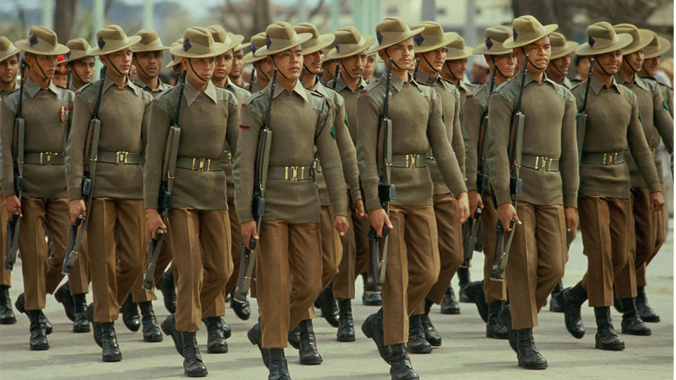 A company of Ghurkas marching in Nepal.