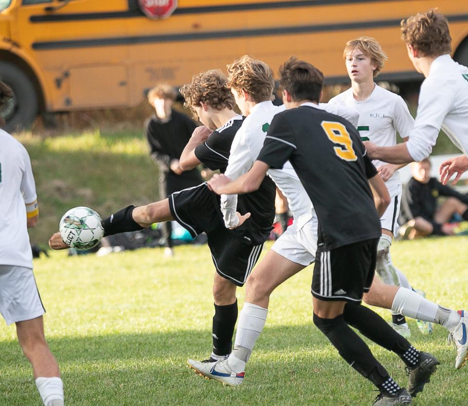 Harwood's Brycen Scharf getting ready to put in the first and only goal for Harwood in the second OT during the D-II boys soccer championship game at Maxfield Sports Complex on Nov. 4, 2023.