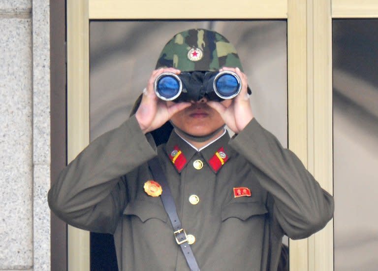 A North Korean soldier at the truce village of Panmunjom, in the demilitarised zone, on April 23, 2013. North and South Korea agreed in principle Thursday to hold their first official talks for years, a move which follows months of escalated military tensions and comes one day before a US-China summit
