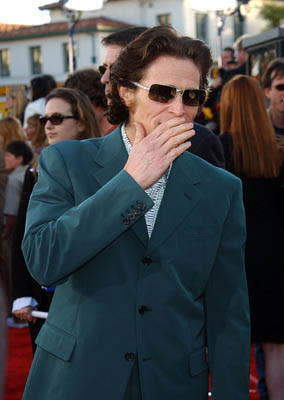 Willem Dafoe whispers a secret to his imaginary friend at the LA premiere of Columbia Pictures' Spider-Man