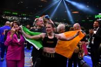 Irish boxer Katie Taylor celebrates her split-decision victory over Puerto Rican Amanda Serrano to retain the undisputed lightweight world title at Madison Square Garden in New York (AFP/Angela Weiss)