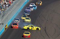 AVONDALE, AZ - MARCH 04: Paul Menard, driver of the #27 Menards/ Tarkett Chevrolet, spins out during the NASCAR Sprint Cup Series SUBWAY Fresh Fit 500 at Phoenix International Raceway on March 4, 2012 in Avondale, Arizona. (Photo by Tyler Barrick/Getty Images for NASCAR)