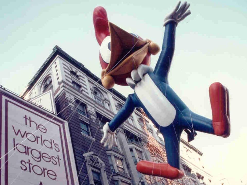 A Woody Woodpecker balloon in the macy's thanksgiving day parade in 1982