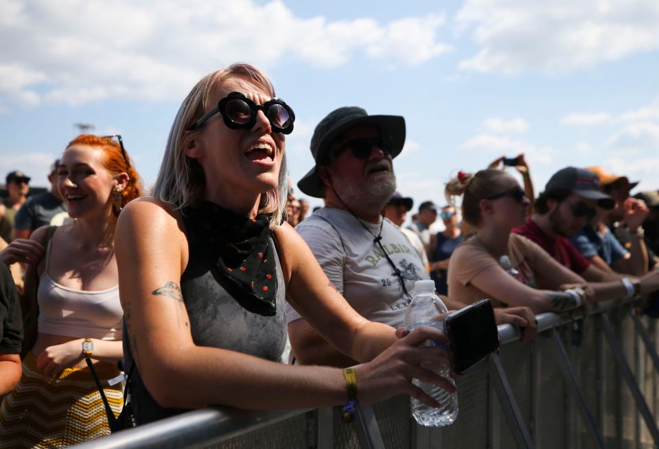 Erin Wibbels of Louisville sings along to Jukebox the Ghost on Sunday at Bourbon and Beyond. Sept. 18, 2022