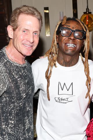 <p>Jerritt Clark/Getty</p> Skip Bayless and Lil Wayne in Los Angeles in September 2022