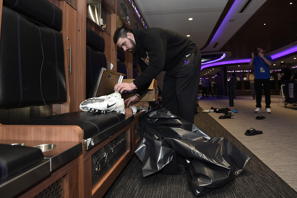 Baltimore Ravens tight end Mark Andrews cleans out his locker Sunday, Jan. 12, 2020 in Owings Mills, MD. (AP Photo/Gail Burton)