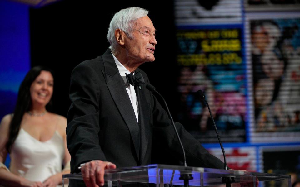 Roger Corman addresses the audience during the Cannes awards ceremony in 2023