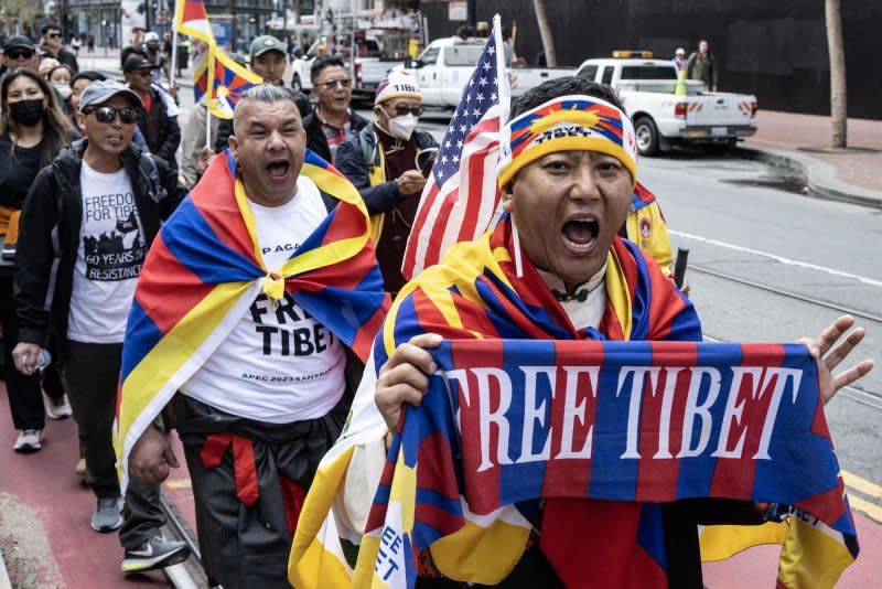Tibetan demonstrators march down Market Street near the Moscone Center in San Francisco on Wednesday during the Asia-Pacific Economic Cooperation (APEC) summit of corporate and world leaders, as President Joe Biden and Chinese President Xi Jinping met in a different location. Photo by Terry Schmitt/UPI