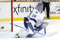 Tampa Bay Lightning goaltender Andrei Vasilevskiy blocks a shot against the Nashville Predators in the second period of an NHL hockey game Saturday, April 10, 2021, in Nashville, Tenn. (AP Photo/Mark Humphrey)