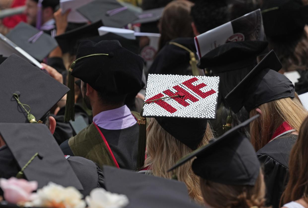A mortar board hat with "THE" on it stands out during the Ohio State Spring 2024 Commencement held Sunday, May 5, 2024 in Ohio Stadium.