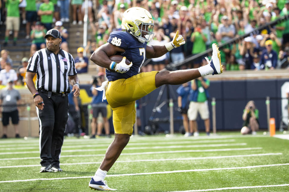 Notre Dame's Audric Estimé (7) celebrates scoring a touchdown during the first half of an NCAA college football game against Tennessee State on Saturday, Sept. 2, 2023, in South Bend, Ind. (AP Photo/Michael Caterina)