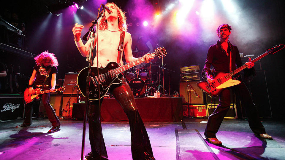 The Darkness perform live onstage in 2003