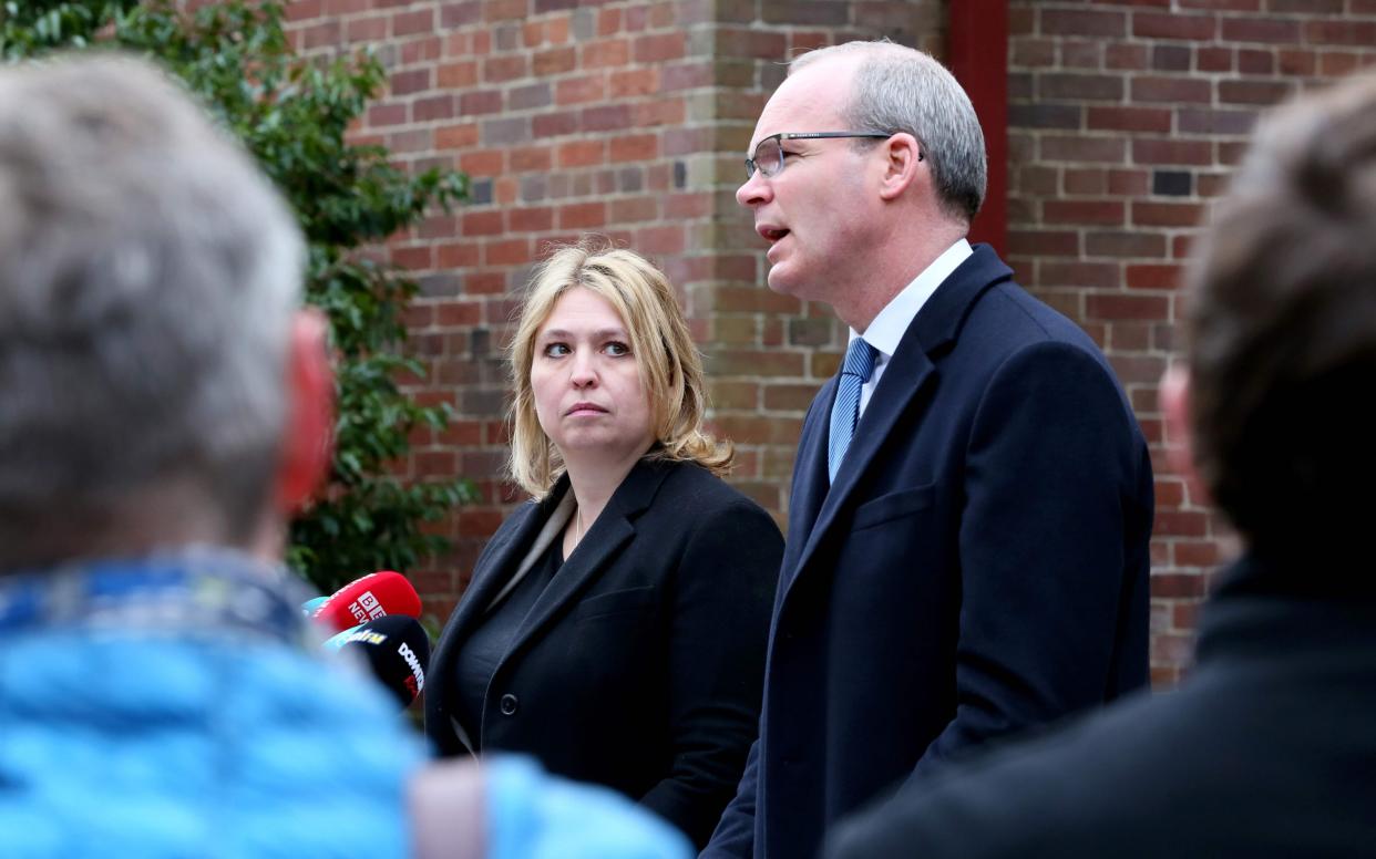 Britain's Northern Ireland Secretary Karen Bradley and Ireland's Foreign Minister Simon Coveney attend a joint press conference at Storming House in Belfast, on January 18 - AFP or licensors