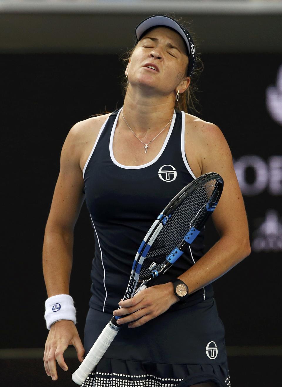 Romania's Alexandra Dulgheru reacts during her second round match against Germany's Angelique Kerber at the Australian Open tennis tournament at Melbourne Park, Australia, January 21, 2016. REUTERS/Jason Reed