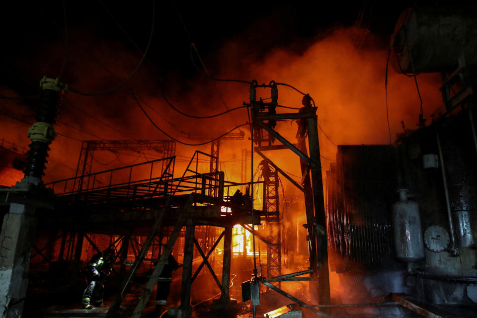 Firefighters work at the site of 5th thermal power plant damaged by a Russian missile strike, amid Russia's attack on Ukraine, in Kharkiv, Ukraine September 11, 2022. REUTERS/Vyacheslav Madiyevskyy