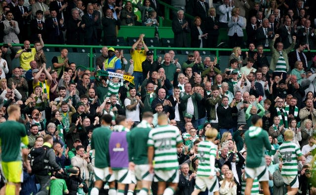 Celtic fans applaud the players after their Scottish Premiership win against Auld Firm rivals Rangers at Celtic Park